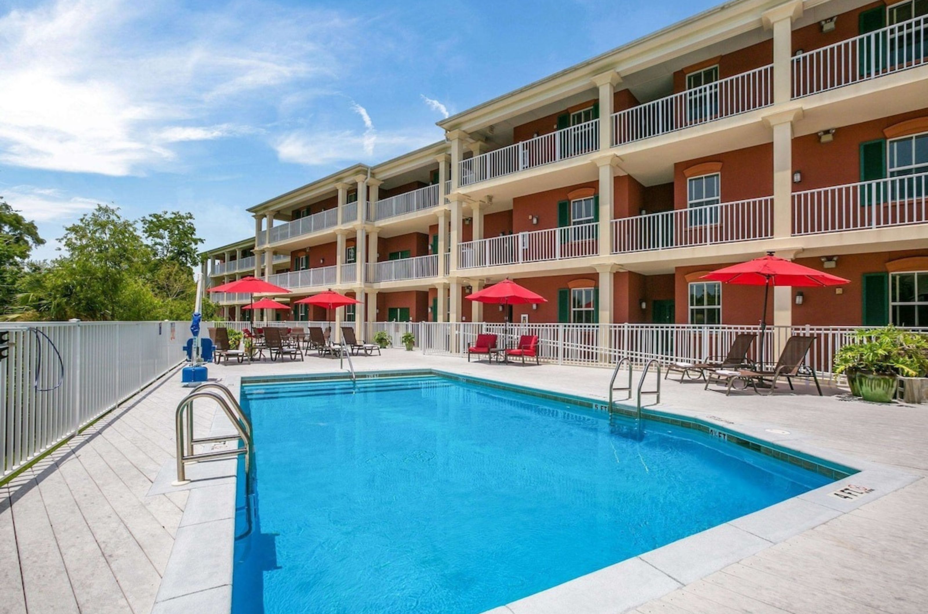 The sparkling outdoor pool in front of Water Street Hotel & Marina in Apalachicola Florida 