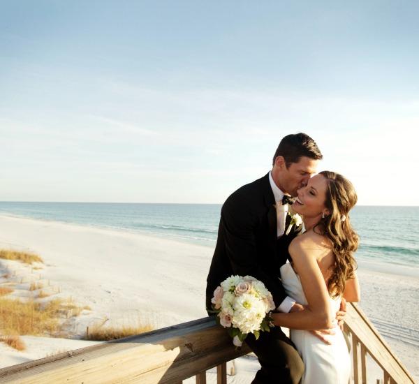 bride and groom on Santa Rosa Beach Florida at WaterColor Inn and Resort